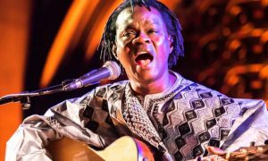 Baaba Maal playing Guitar