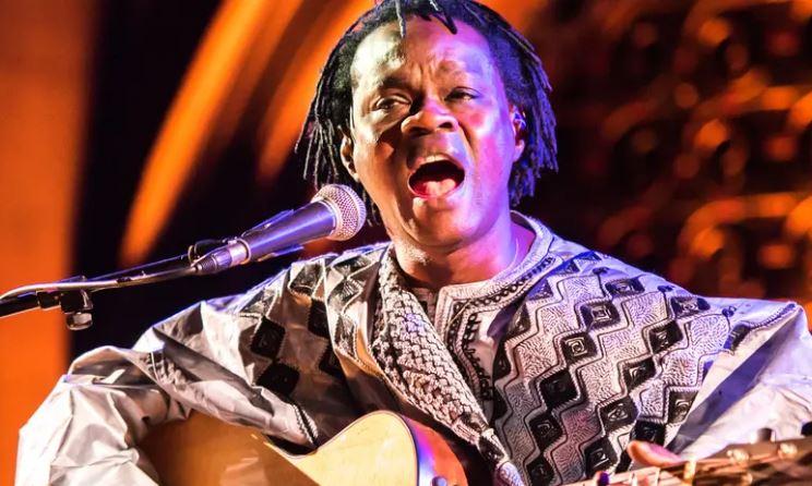 Baaba Maal playing Guitar